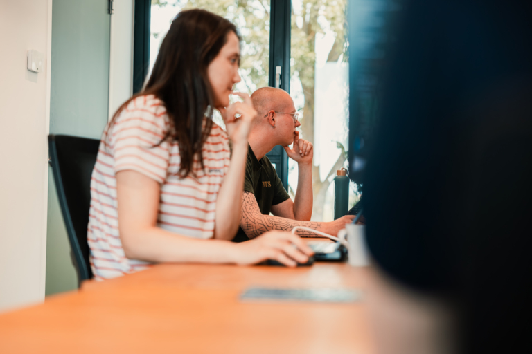 Sfeerbeeld New Nexus collega's AI Solutions aan het werk